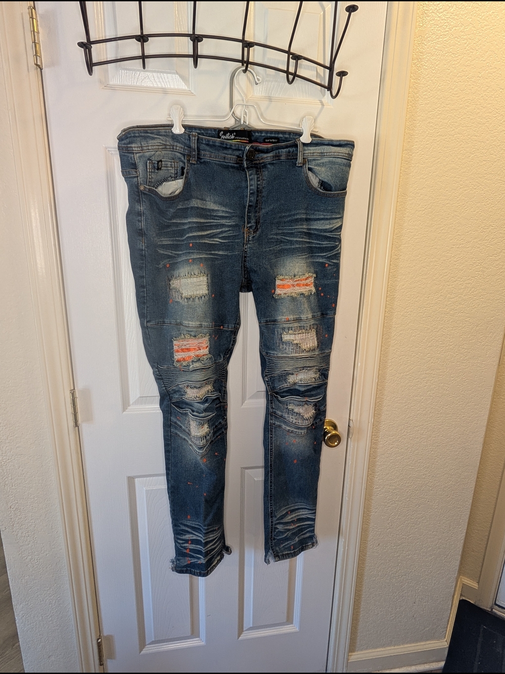 Switch Remarkable Blue Jeans with Paint-Splatter Detail